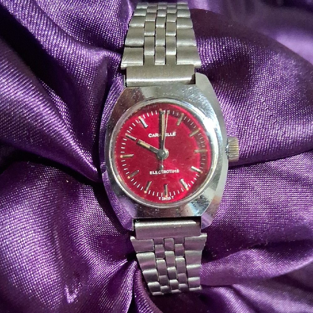 Caravelle watch with Red Dial and Silver Band